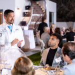 Dr. Javier Cardenas discusses brain injury with Christian Kirk