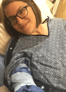 Alison Coombs in hospital bed after CSF leak surgery