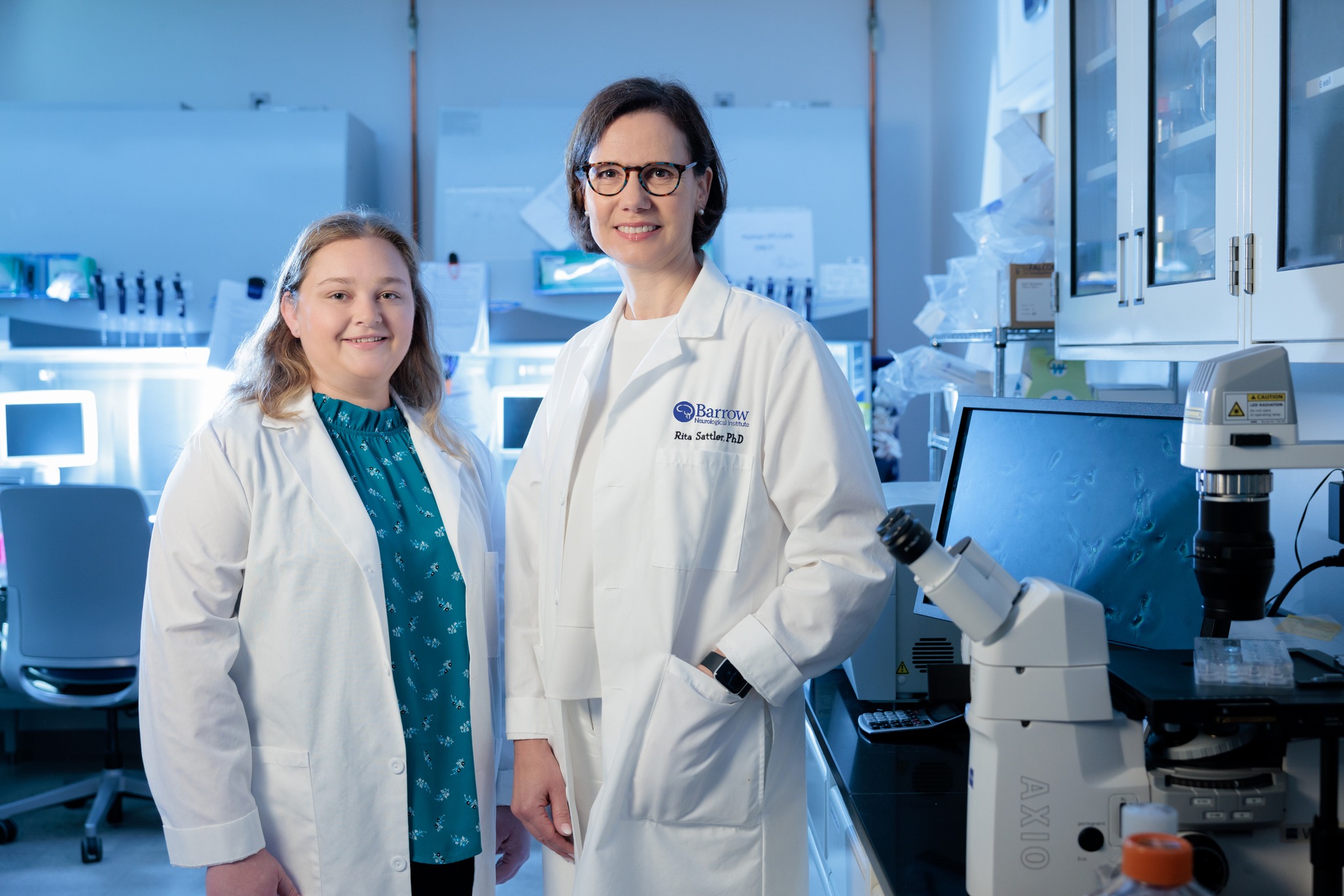 Lab portrait of Dr Rita Sattler and Briana Ondatje who have just been awarded a research grant.